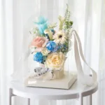 Blue Promise – Flower Arrangement In Small Clear Box