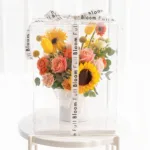 Peachy Sunrise - Flower Arrangement in Clear Box